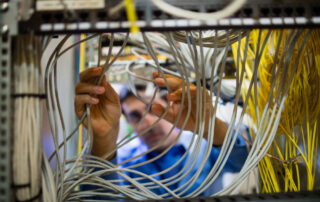 technician fixing cable